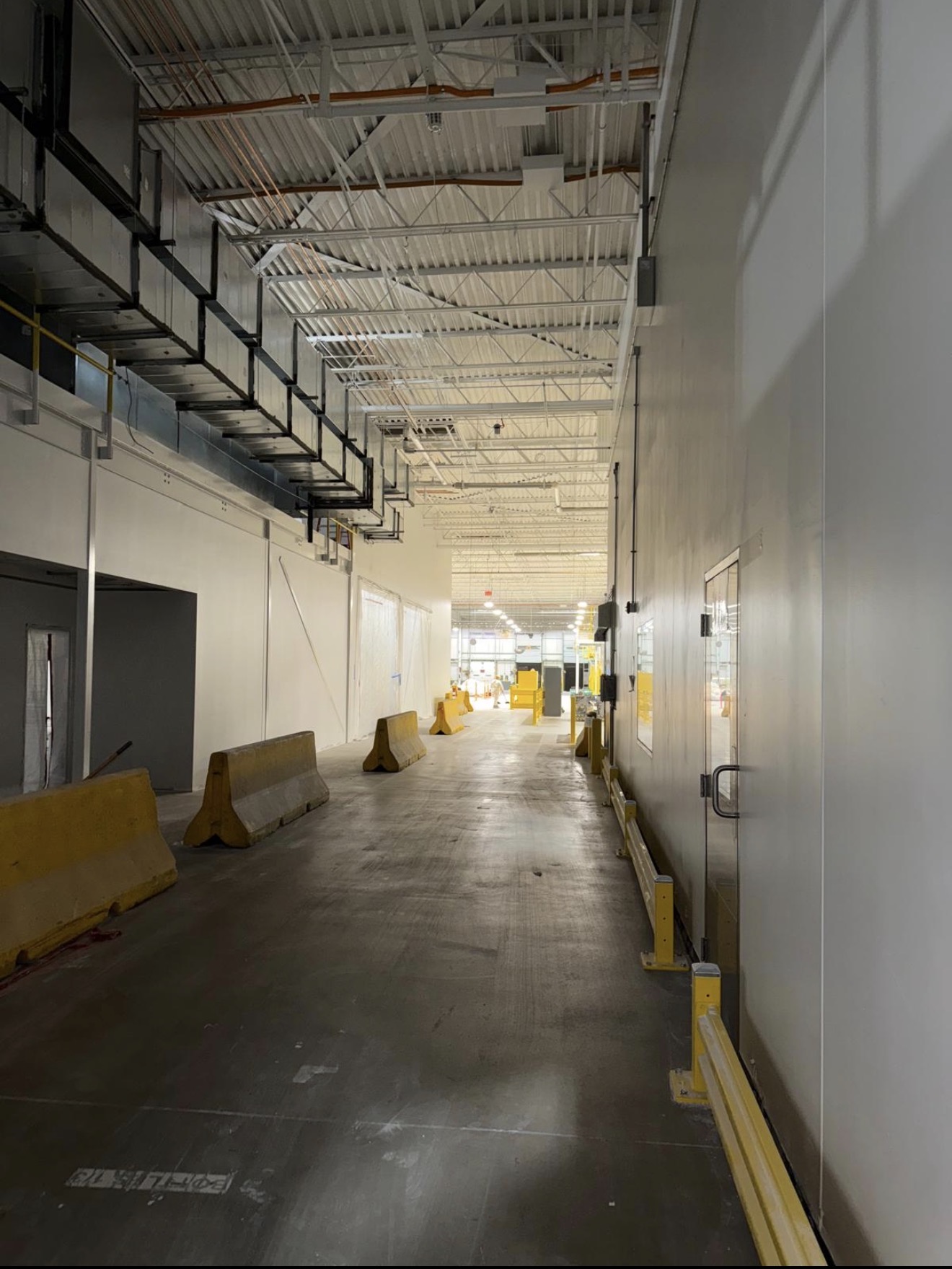 Industrial warehouse cleaning using professional equipment